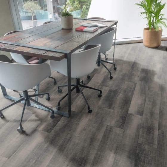 Office meeting room featuring Amtico Signature Lock Oak in Stripwood pattern