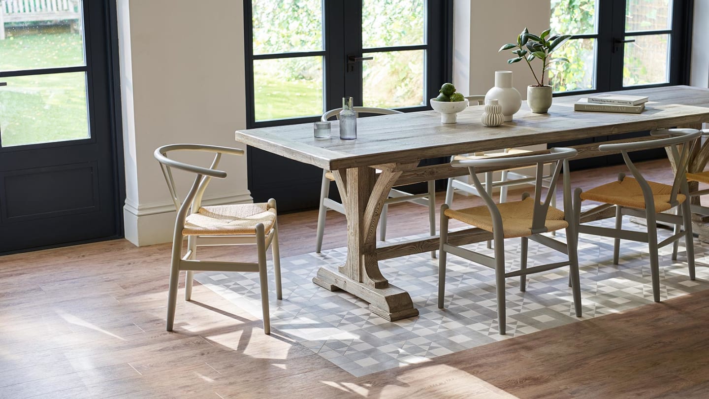 Amtico Geo Melrose forms a eye-catching feature under a dining room table