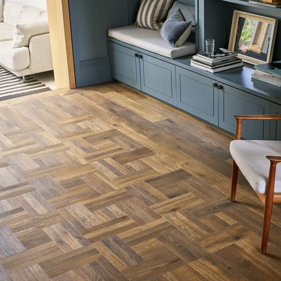 Signature Whinlatter Oak creates definition for living room flooring.