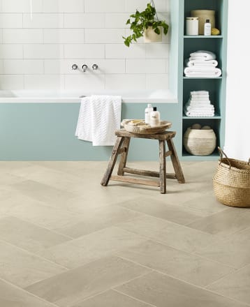 Amtico Crema LVT in a bathroom, laid in a herringbone pattern